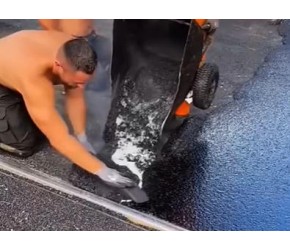 这样手工铺设的沥青路面结实吗？